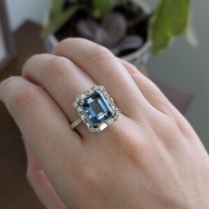 11x9mm 5.45cts London Blue Topaz and Earth Mined Diamonds Ring in 14k Dual Gold