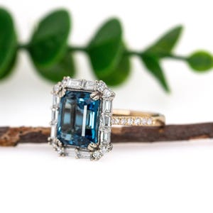11x9mm 5.45cts London Blue Topaz and Earth Mined Diamonds Ring in 14k Dual Gold