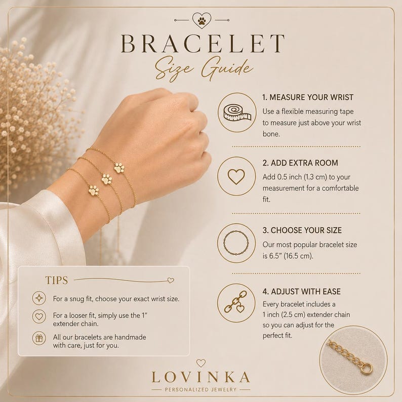 May include: A bracelet size guide infographic featuring a gold chain bracelet with three paw print charms on a wrist. The text provides instructions for measuring the wrist, adding 0.5 inch for comfort, choosing a 6.5 inch size, and using a 1 inch extender.