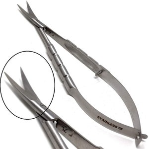 May include: A pair of stainless steel surgical scissors with a curved blade and a spring-loaded handle. The scissors are marked "STAINLESS CE" and "5.5".