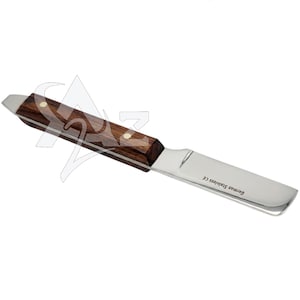 May include: A stainless steel knife with a wooden handle. The handle is a dark brown color with two brass rivets. The blade is silver and has the text "German Stainless CE" printed on it.