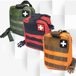 May include: Three different first aid kits with a red cross symbol on each. The kits are made of a durable, water-resistant material and have adjustable straps for easy carrying.