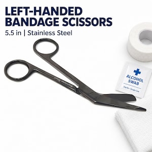 May include: Left-handed bandage scissors made of stainless steel, measuring 5.5 inches. The black-toned scissors feature two finger loops and angled blades. Beside the scissors are a white roll of medical tape and a sterile alcohol swab packet.