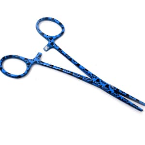 May include: Blue hemostatic forceps with a paw print design. The forceps are made of stainless steel and have a spring-loaded mechanism.