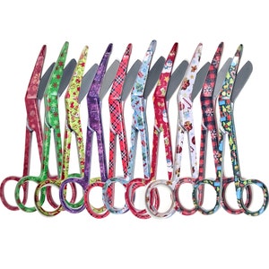 May include: A set of ten Christmas-themed scissors with colorful patterns, including red, green, and white. The scissors have a curved handle and a sharp blade.