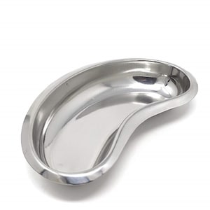May include: A stainless steel kidney dish, a medical tray with a curved shape.