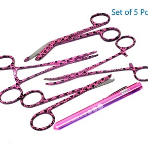May include: Set of five pink surgical clamps with paw print designs, and a pink penlight with a white label.  Set of 5 Pcs.