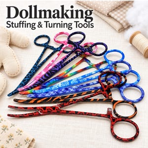 May include: A collection of metal hemostat-style dollmaking stuffing and turning tools featuring various colorful patterns including blue leopard print, pink zebra stripes, rainbow tie-dye, blue floral, blue plaid, orange tiger stripes, and red leopard print.