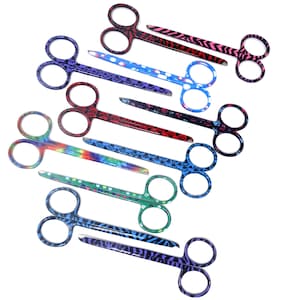 May include: A set of ten colorful stainless steel scissors with different patterned designs. The scissors have a blunt tip and are ideal for crafts, grooming, and other delicate tasks.