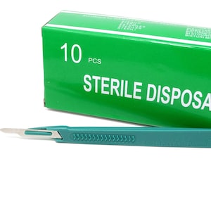 May include: A pack of 10 sterile disposable scalpels. The box is green with white text that reads "STERILE DISPOSABLE". A single scalpel is shown with a green handle and a silver blade.