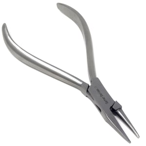 May include: Silver-toned jewelry pliers with a pointed tip and the text "German Stainless" on the handle.