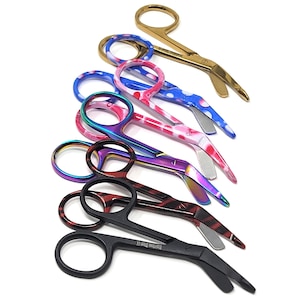 May include: Set of seven colorful surgical scissors with a curved blade. The scissors have different colored handles with a variety of patterns, including polka dots, stripes, and swirls. The blades are made of stainless steel and are sharp.