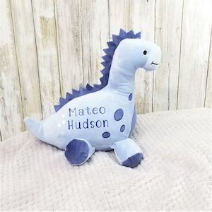 Personalized Birth Stats Plush Dinosaur with baby&#39;s name and birth statistics for a new baby or baby shower gift.