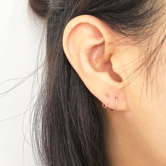 Wearing shop fake earrings