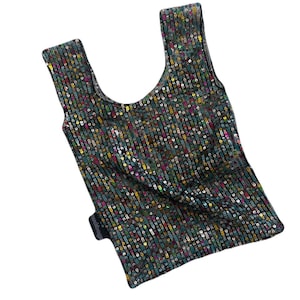 May include: A sleeveless top with a scoop neck, made of a black fabric with colourful sequins. The sequins are arranged in a vertical pattern.