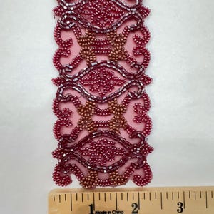 Gorgeous Beaded Trim. Trims, Doll Trims,Costumes, Home Decor. Sold by the Yard. Col. Burgundy