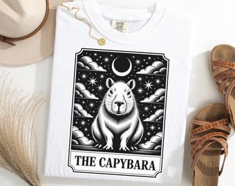 Camiseta de tarô Capivara, camiseta com estampa mística de Capivara, camiseta de animal celestial, camiseta de capivara com lua e estrelas, camiseta de natureza oculta