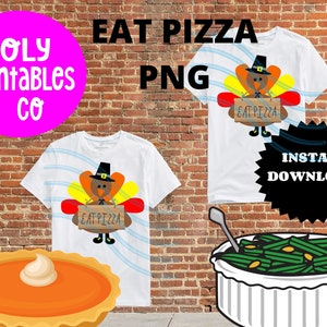 May include: Two white t-shirts with a Thanksgiving turkey design holding a sign that says "Eat Pizza". The design is in orange, brown, red, and yellow. The t-shirts are on a brick wall background.
