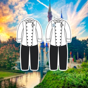 May include: Two white chef jackets with black pants and black buttons. Both jackets have a name tag with the letters "CM" on them. One jacket has a blue pin with a letter "G" on it.