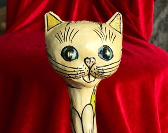 tall wooden cats