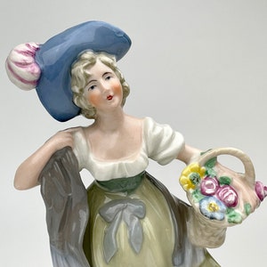 Rare Porcelain lady figurine by CARL SCHEIDIG (Germany), Porcelain lady figurine from 1906-1935, lady with basket of flowers