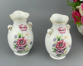 Pair of vintage flower vases by Crown porcelain