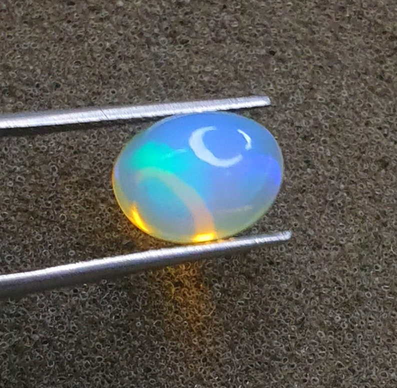 Natural White Welo Opal Beautiful Multi Fire Eithiopian Multi Opal Size 10X8X6 mm Cts 2.20 Oval Shape Opal Cabochon Gemstone Jewelry Making