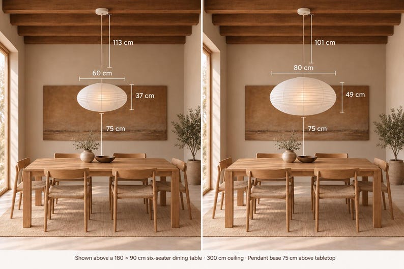May include: Two white oval paper pendant lights hanging over a wooden dining table. The left light measures 60 cm wide by 37 cm high, and the right light measures 80 cm wide by 49 cm high. Both are positioned 75 cm above the table surface.