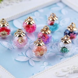 10Pcs Cristal con Flor Bola de vidrio Amuletos Bola de cristal Colgante DIY Femenino Clips para los oídos Pendientes Joyería Accesorios Materiales Suministros de artesanía