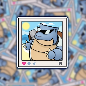 May include: A cartoon illustration of a blue and brown Pokemon character wearing sunglasses and a backpack. The character is standing on a beach with a yellow sun in the background. The image is framed in a white square with a pink heart, a blue speech bubble, and a white bookmark.
