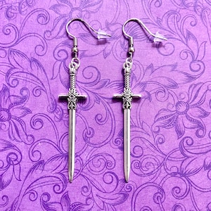 Silver tone sword earrings