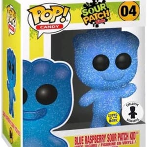 May include: A Funko Pop Candy vinyl figure of a blue raspberry Sour Patch Kid in its original packaging. The box features the number 04, the Sour Patch Kids logo, and a circular sticker indicating that the figure glows in the dark.