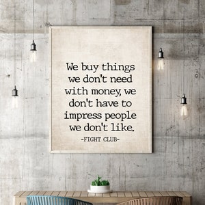 May include: A black and white typography print with a quote from the movie Fight Club: "We buy things we don't need with money, we don't have to impress people we don't like." The quote is printed on a textured background.