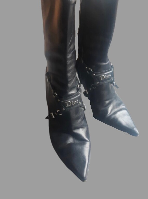 black boots silver buckles