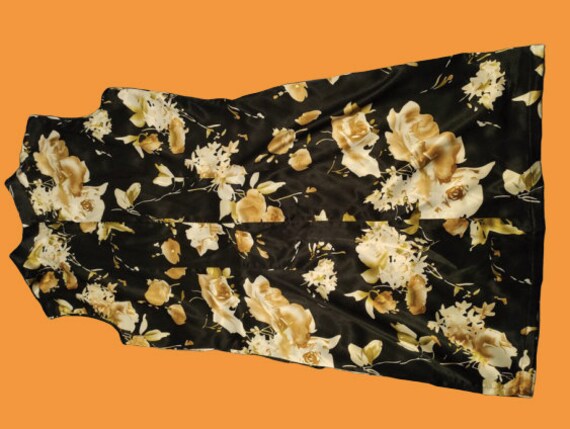 black blouse with yellow flowers