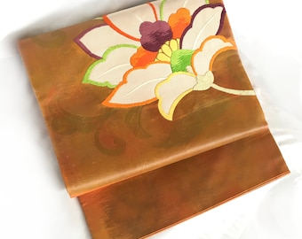 Vivid Nagoya obi - copper and orange with colorful magnolia flower