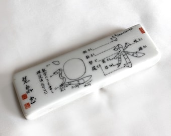 Japanese ceramic paperweight - calligraphy lesson