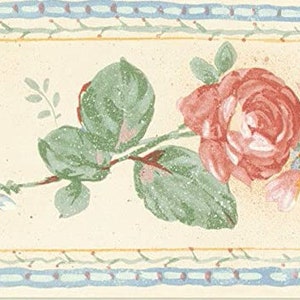 May include: A vintage-style wallpaper border with a delicate floral design. The border features a pink rose, yellow flower, and green leaves on a cream background. The border is accented with a blue and yellow trim.