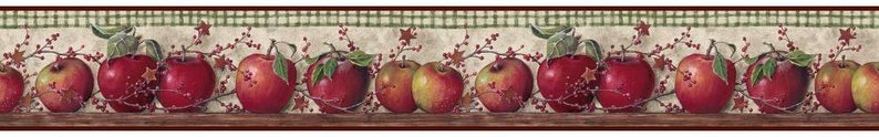 May include: A red and green apple border with a checkered pattern background. The apples are arranged in a row with leaves and berries.