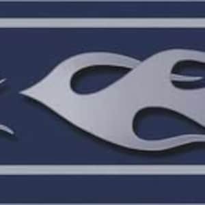 May include: A blue and silver wallpaper border with a flame design. The flames are silver and the background is blue. There are two thin silver stripes at the top and bottom of the border.