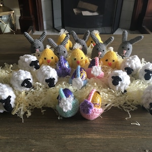 Crocheted creme egg cosies