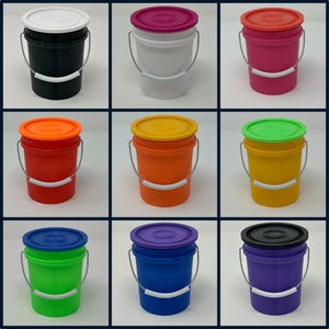 May include: Nine brightly coloured plastic buckets with lids. The buckets are in various colours, including black, white, pink, red, orange, yellow, green, blue, and purple. Each bucket has a metal handle and a white plastic handle grip.