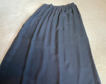 Harari solid silk georgette skirt with solid black silk chiffon over lay and elastic waist  Size M