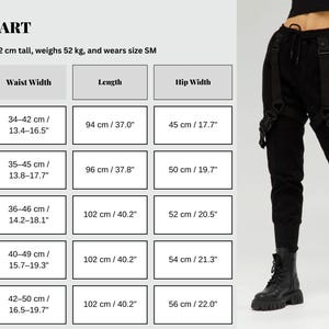 May include: Black cargo pants with adjustable straps and buckles, paired with black boots. A size chart displays waist, length, and hip measurements in both centimeters and inches. The model is 172 cm tall and wears size SM.