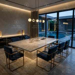 May include: A rectangular dining table with a light-coloured stone top and a geometric base, surrounded by six dark blue upholstered chairs with gold-toned metal frames. A linear pendant light with five spherical bulbs hangs above the table.
