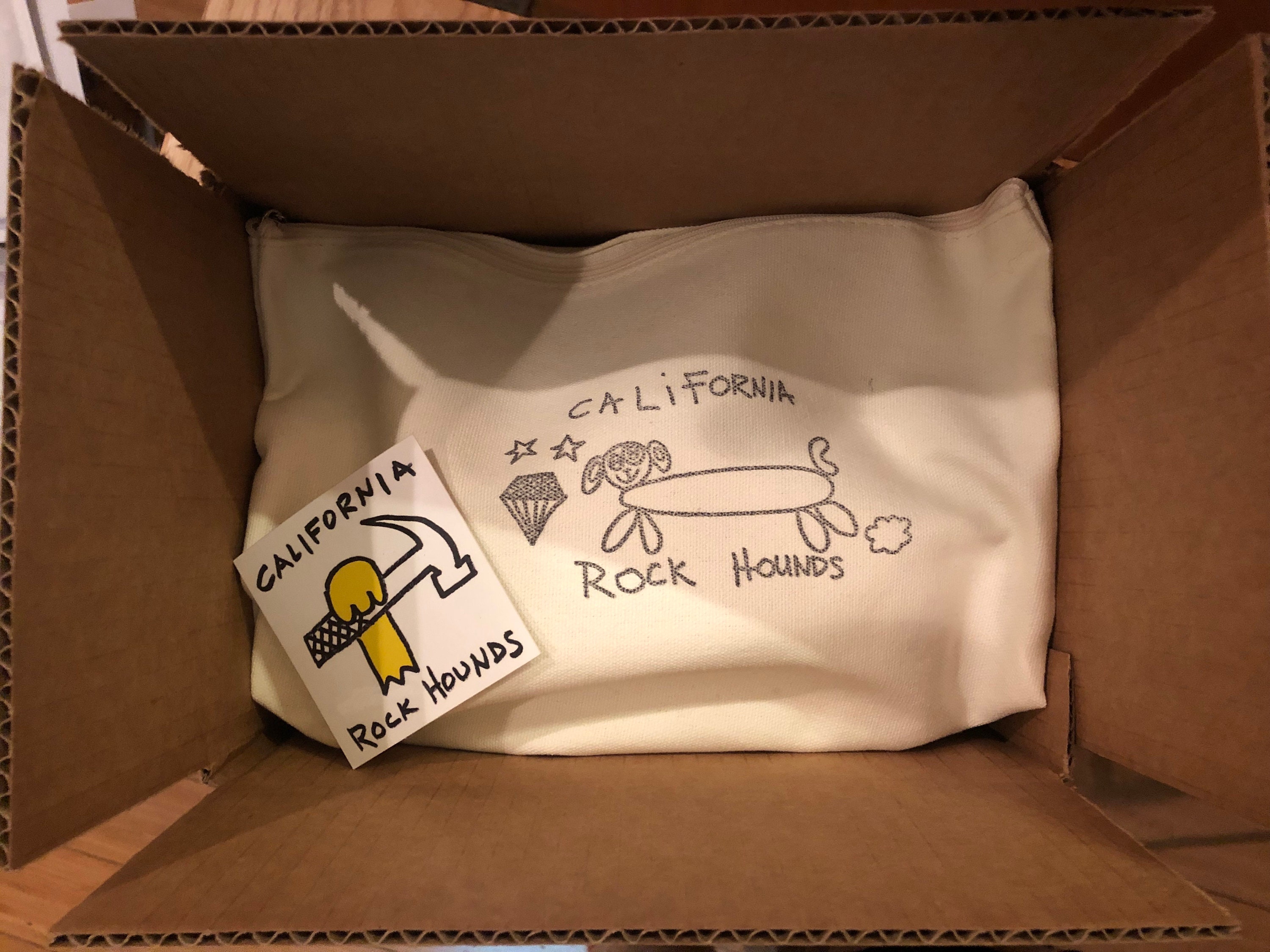 A Geode Smashing Kit in a Zippered Pouch With 2 Medium Sized Geodes ...