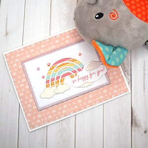 Carte de vœux faite main en rose avec arc-en-ciel pastel