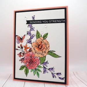 Carte de sympathie faite main avec des fleurs à l'aquarelle