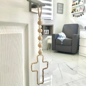 Cintre de poignée de porte croisée