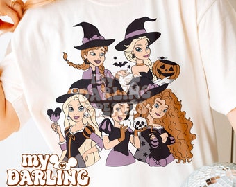 May include: White t-shirt with a graphic of five Disney princesses dressed as witches for Halloween. The princesses are Anna, Elsa, Belle, Snow White, and Rapunzel. The text "my darling creates" is printed on the bottom of the shirt.